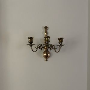 Vintage brass candle holder wall sconce.